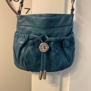 B Makowsky teal leather crossbody with silvertone detail
